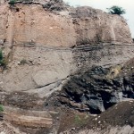 Section through deposits from South soufriere hills in O'Garra's quarry, showing lava flow, pyroclastic falls, pyroclastic flows and pyroclastic surges.